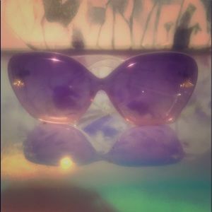 Purple framed/purple lenses Gucci sunglasses